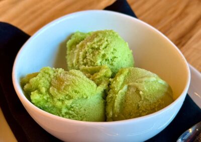 three scoops of lemon basil sorbet, a beautiful green color