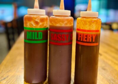 Porky Butts three BBQ sauces