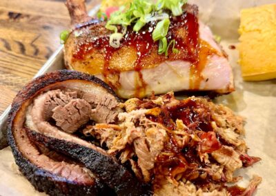 Porky Butts Meat Trio plate with Chicken Quarter, Brisket and Pulled Pork