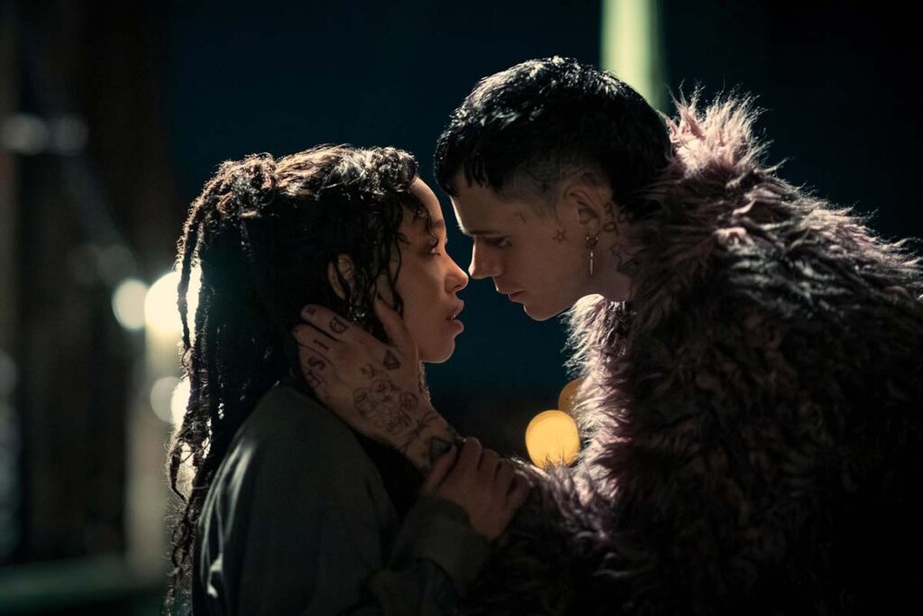 Bill Skarsgård and FKA twigs embrace for a kiss