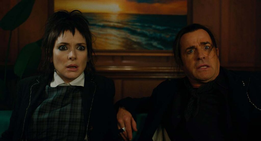 Winona Ryder as Lydia Deetz and Justin Theroux as Rory