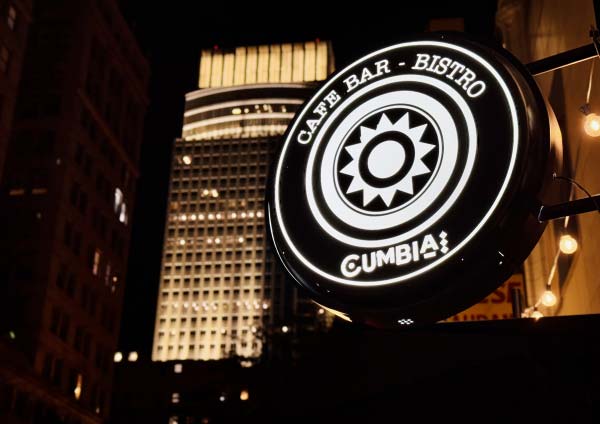 Shot of Cumbia signage in downtown Omaha at night