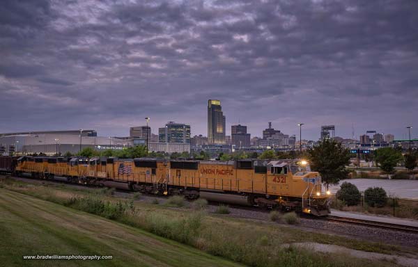 Union Pacific train with Omaha skyline in background, photo by Brad Williams