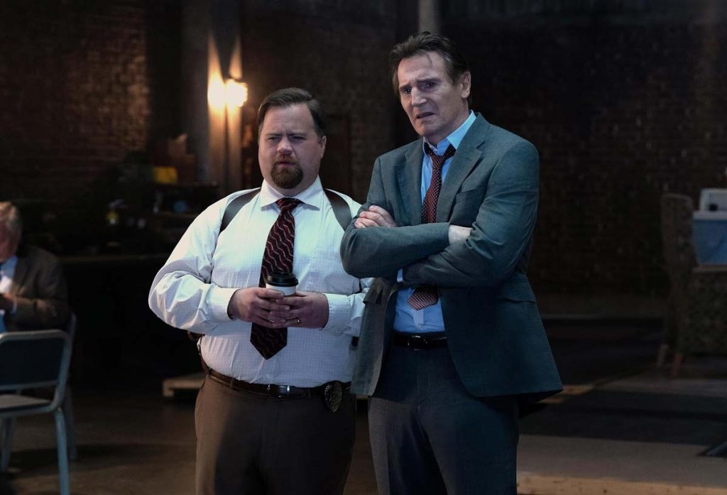Paul Walter Hauser as Ed Hocken Jr and Liam Neeson as Frank Drebin Jr