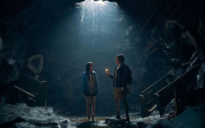 Together movie review featured image Allison Brie and Dave Franco alone in a cavern