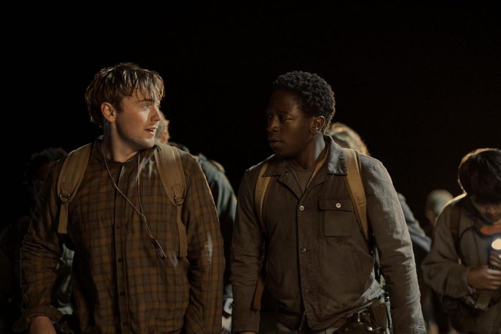 Cooper Hoffman as Raymond #47 and David Jonsson as Peter #23 walking at night
