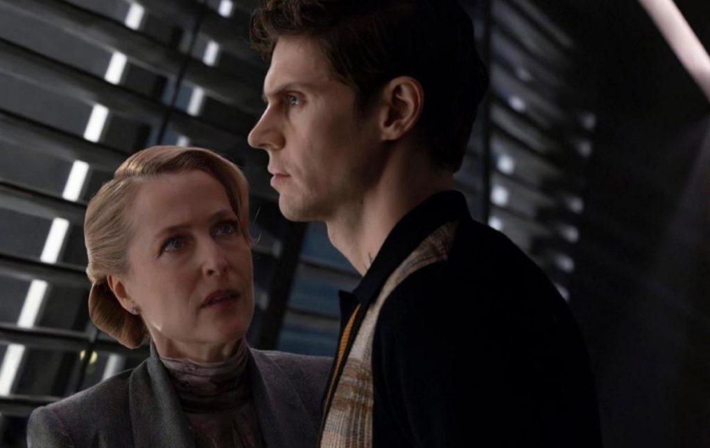Gillian Anderson as Elisabeth and Evan Peters as Julian