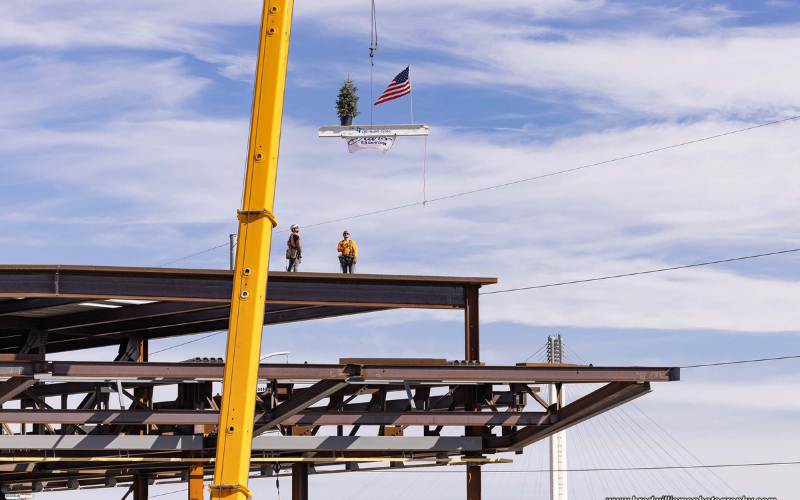MECA Holds Topping Out Ceremony