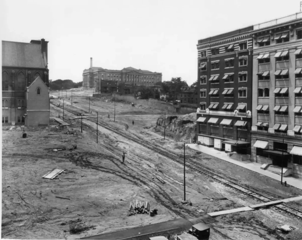 1921 During the grading of Dodge. Looking west from 19th and Dodge. El Buedor is on the right