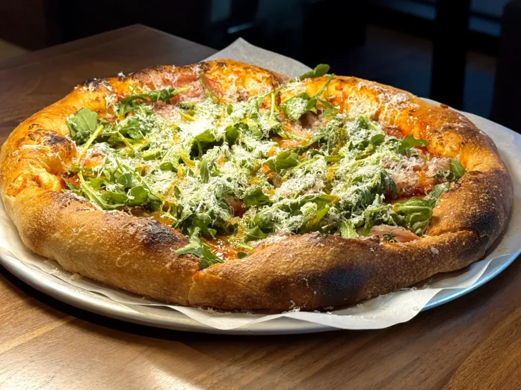 Hot honey and smoked prosciutto pizza