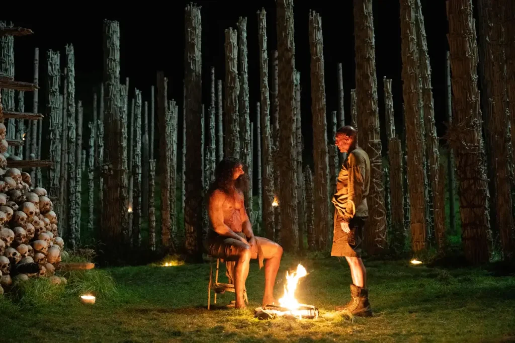 Ralph Fiennes as Dr. Kelson and Chi Lewis-Parry as Samson
