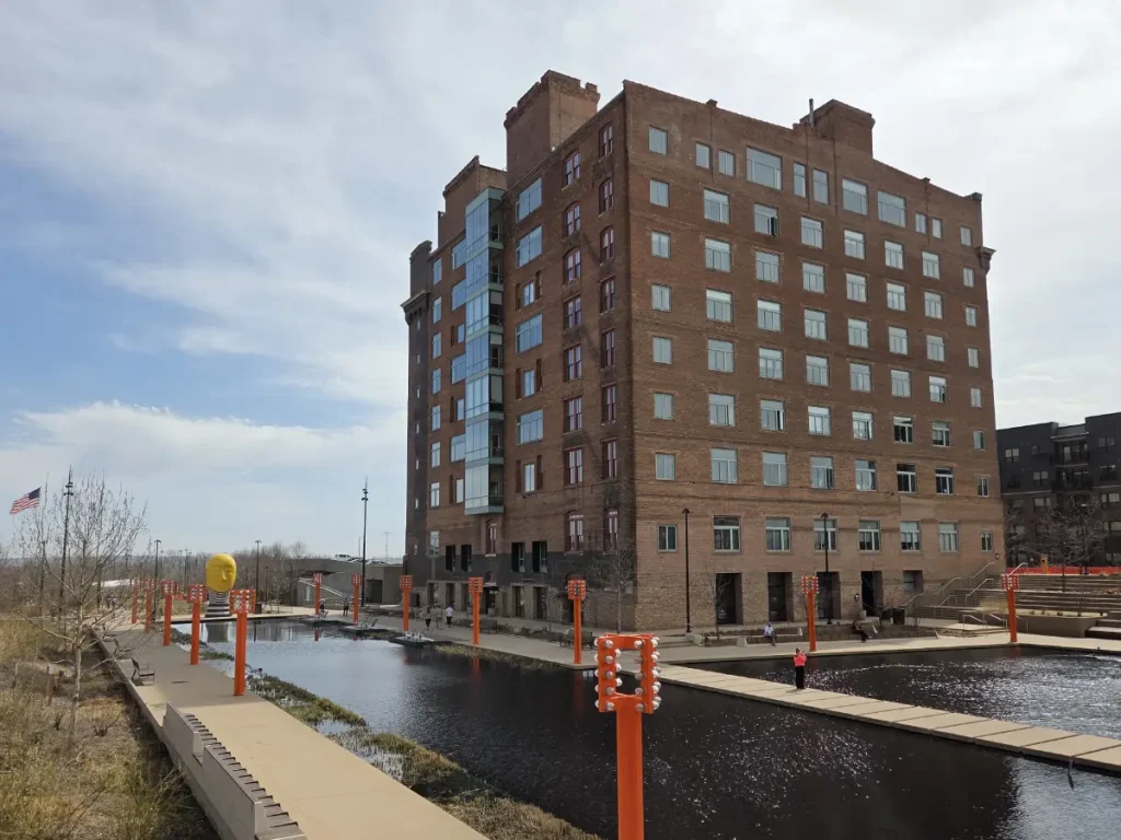 Looking at the west and north sides of the Greenhouse apartments (McKesson-Robbins Building) from within Gene Leahy Mall.