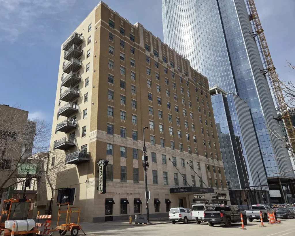 2026 photo of The Paxton condominiums looking north from 14th Street towards the Mutual of Omaha Tower