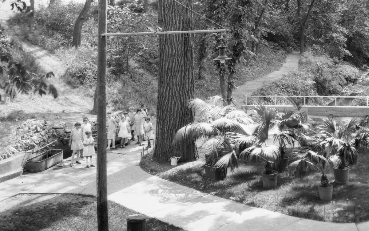 People waiting for water at the spring inside Omaha’s Elmwood Park in 1926.