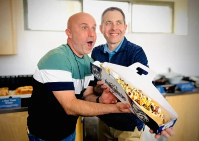 Showing off the 2 Foot Team Wiener at media day