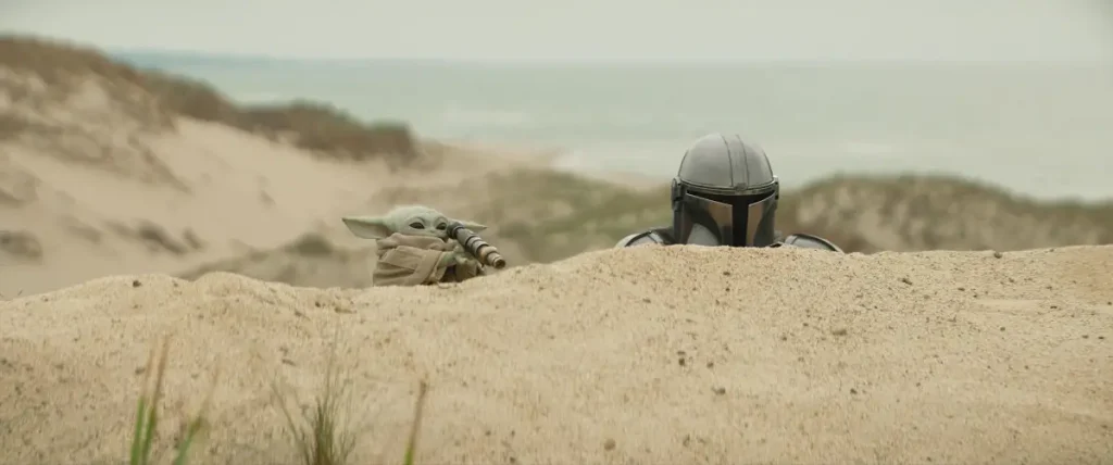 Grogu with Pedro Pascal as The Mandalorian