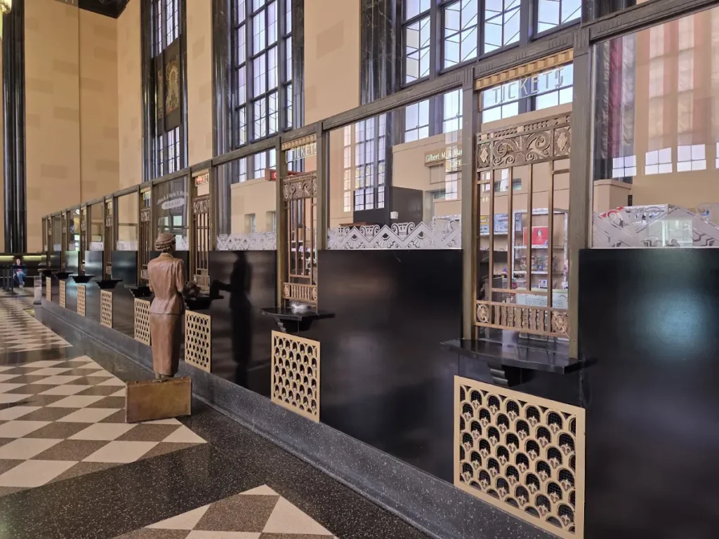 2026 photo of the old Union Station ticket counter with the gift shop behind it at Durham Museum