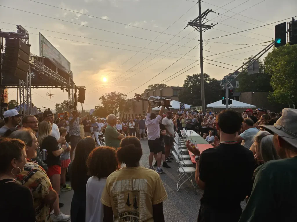 The Santa Lucia Festival in the evening with the cannoli eating contest ready to begin