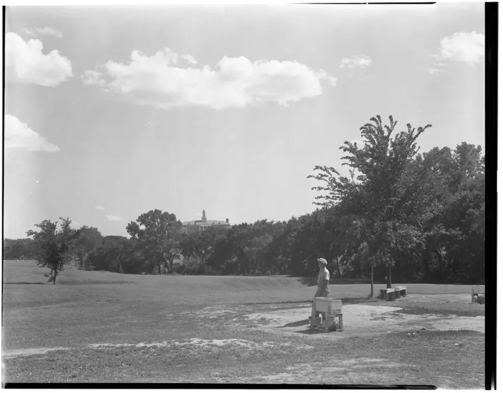 1938 photo of Happy Hollow Golf Course with the UNO in the background. This is present day Memorial Park.