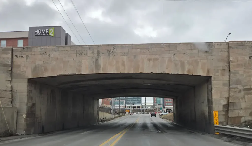 2026 photo of the north side of the Saddle Creek Underpass where the decorative stone remains intact.